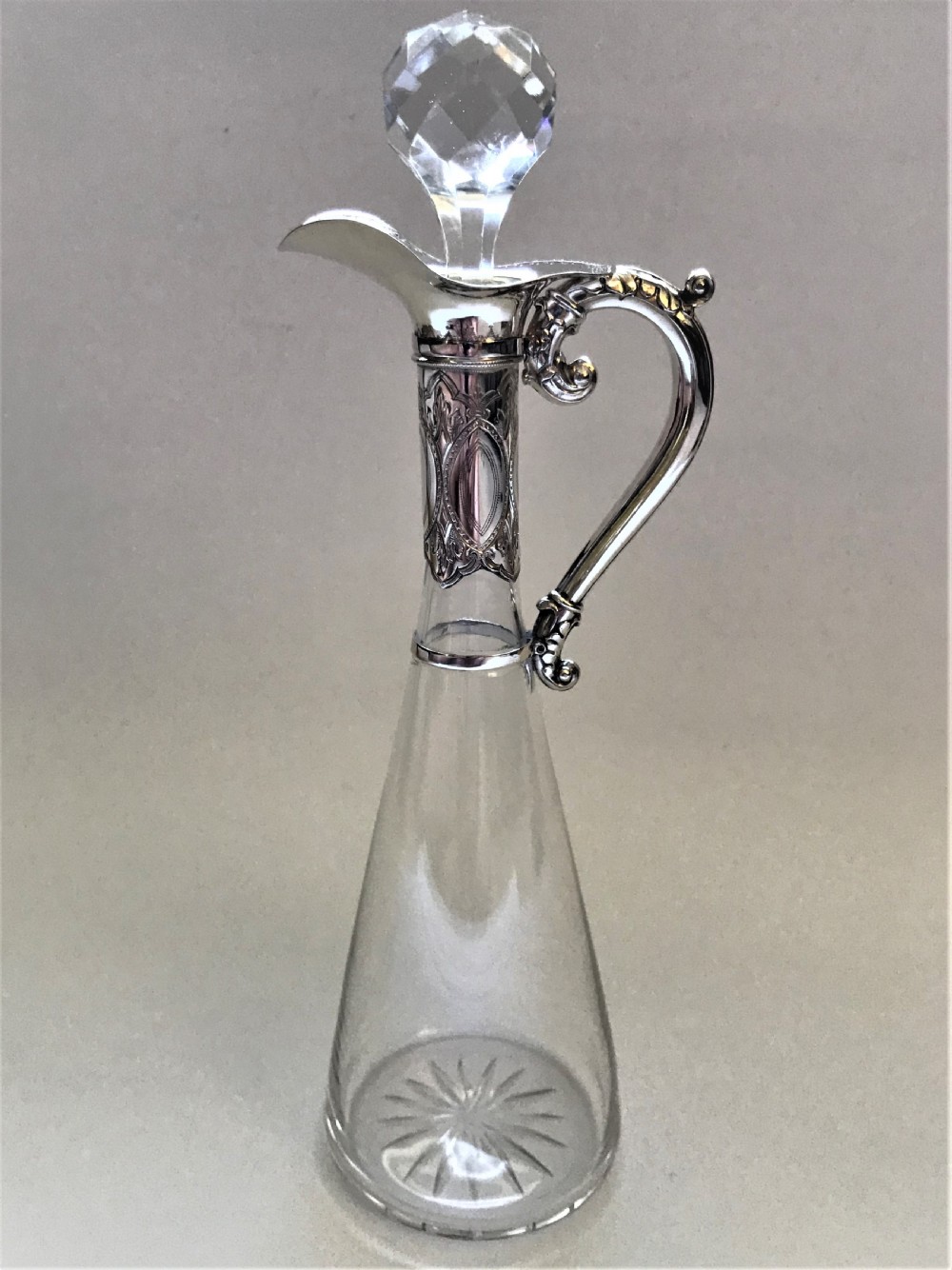 A gorgeous Dutch silver mounted spirit jug