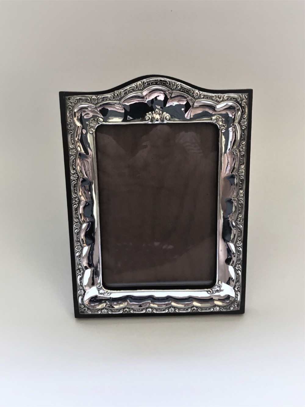 A handsome George V silver photo frame View II