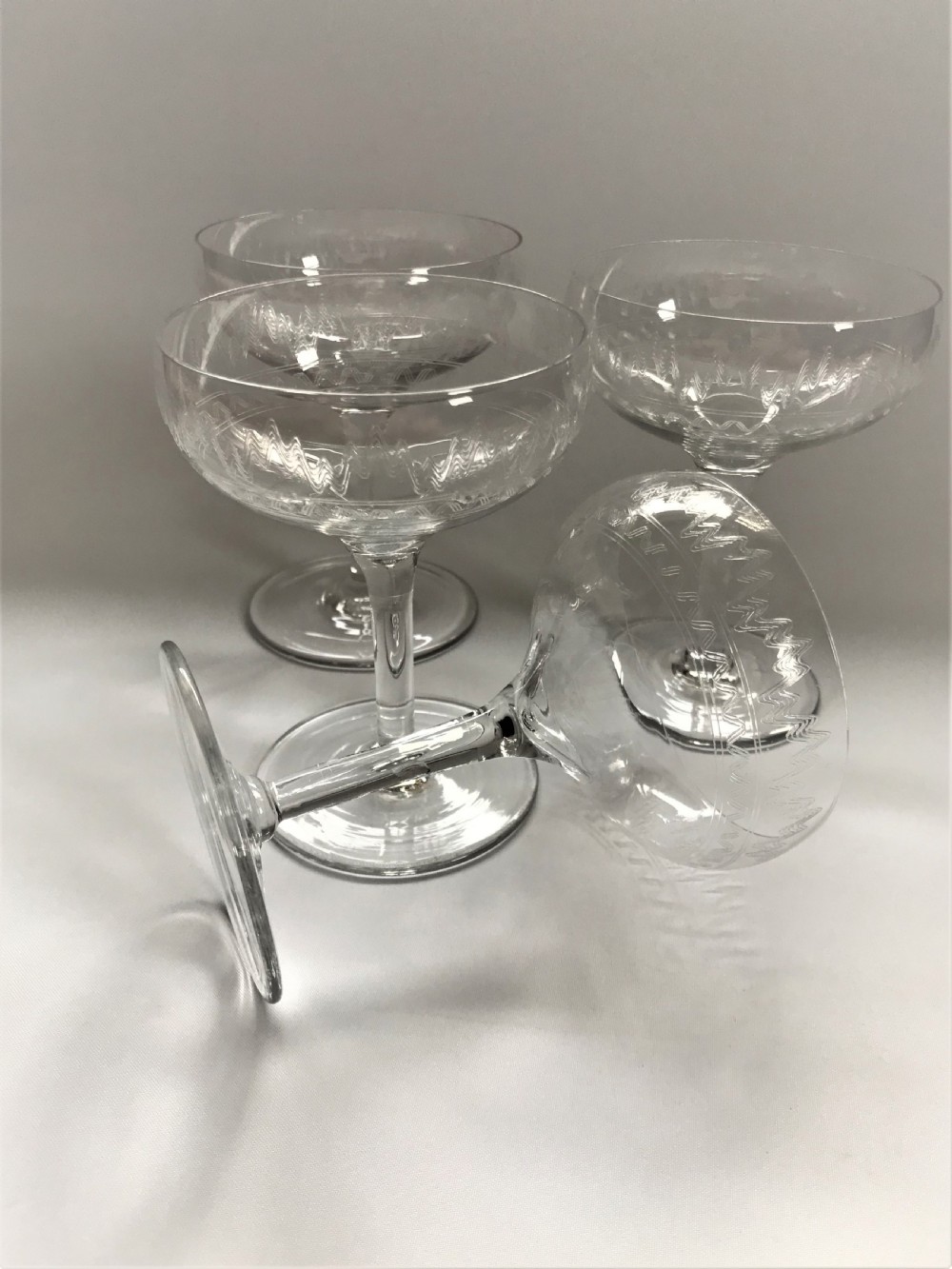A set of 4 etched champagne bowls View III