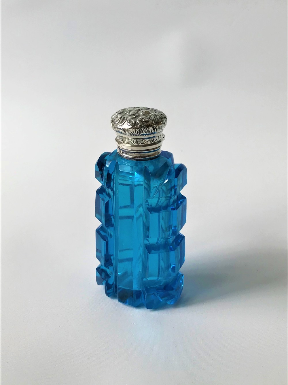 A stunning Victorian silver mounted scent bottle