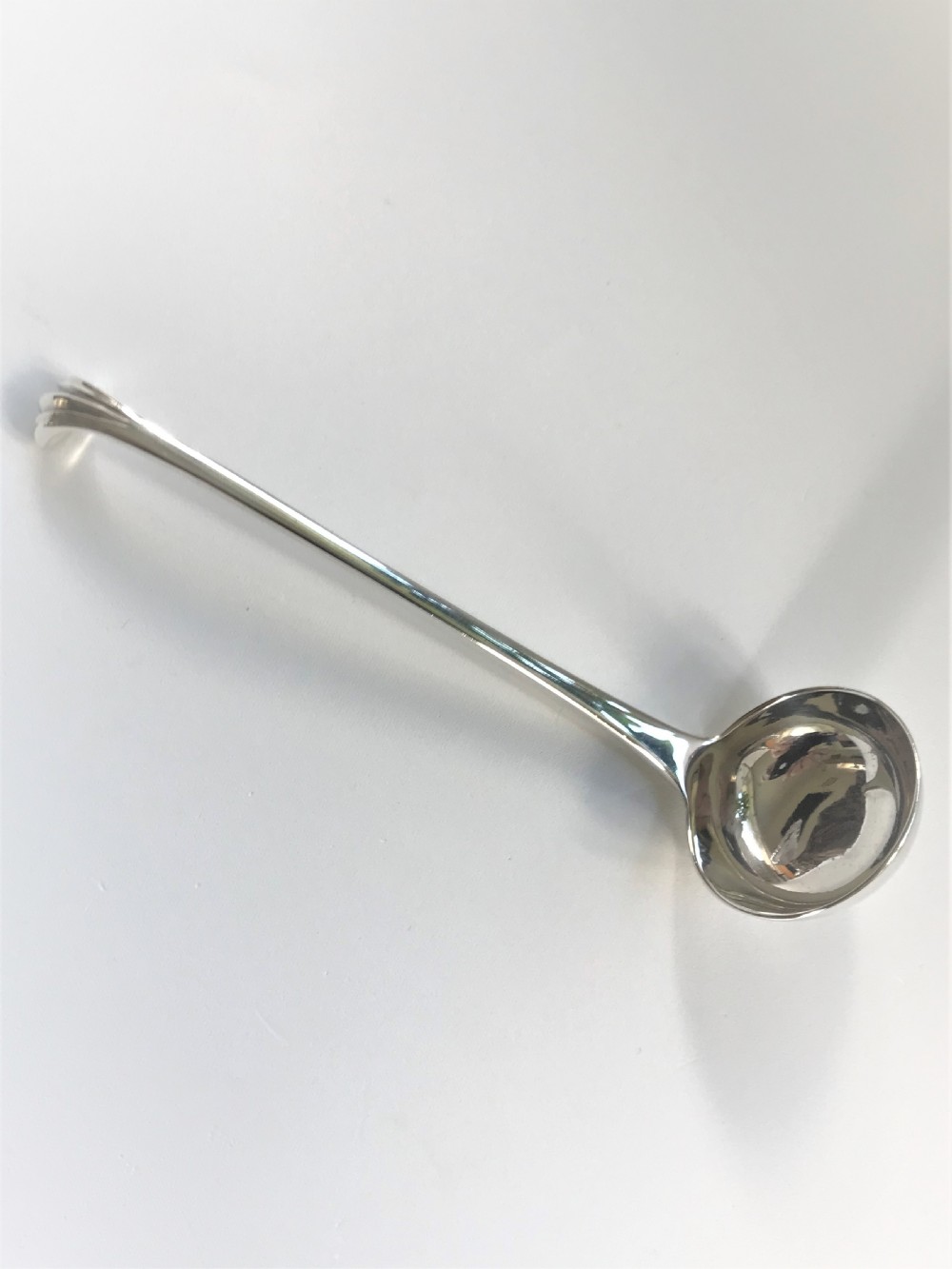 A charming small Onslow pattern silver cream
