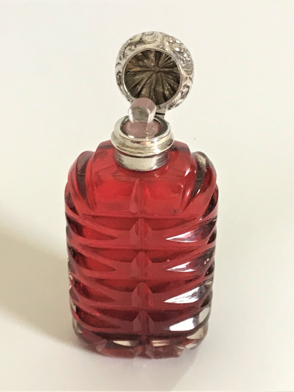 A delightful Victorian cranberry silver mounted scent bottle View IV