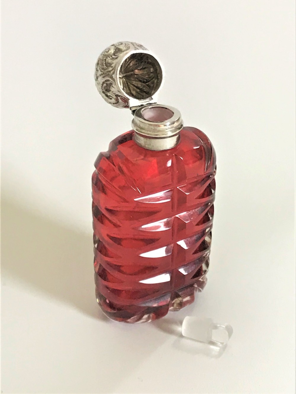 A delightful Victorian cranberry silver mounted scent bottle View VI