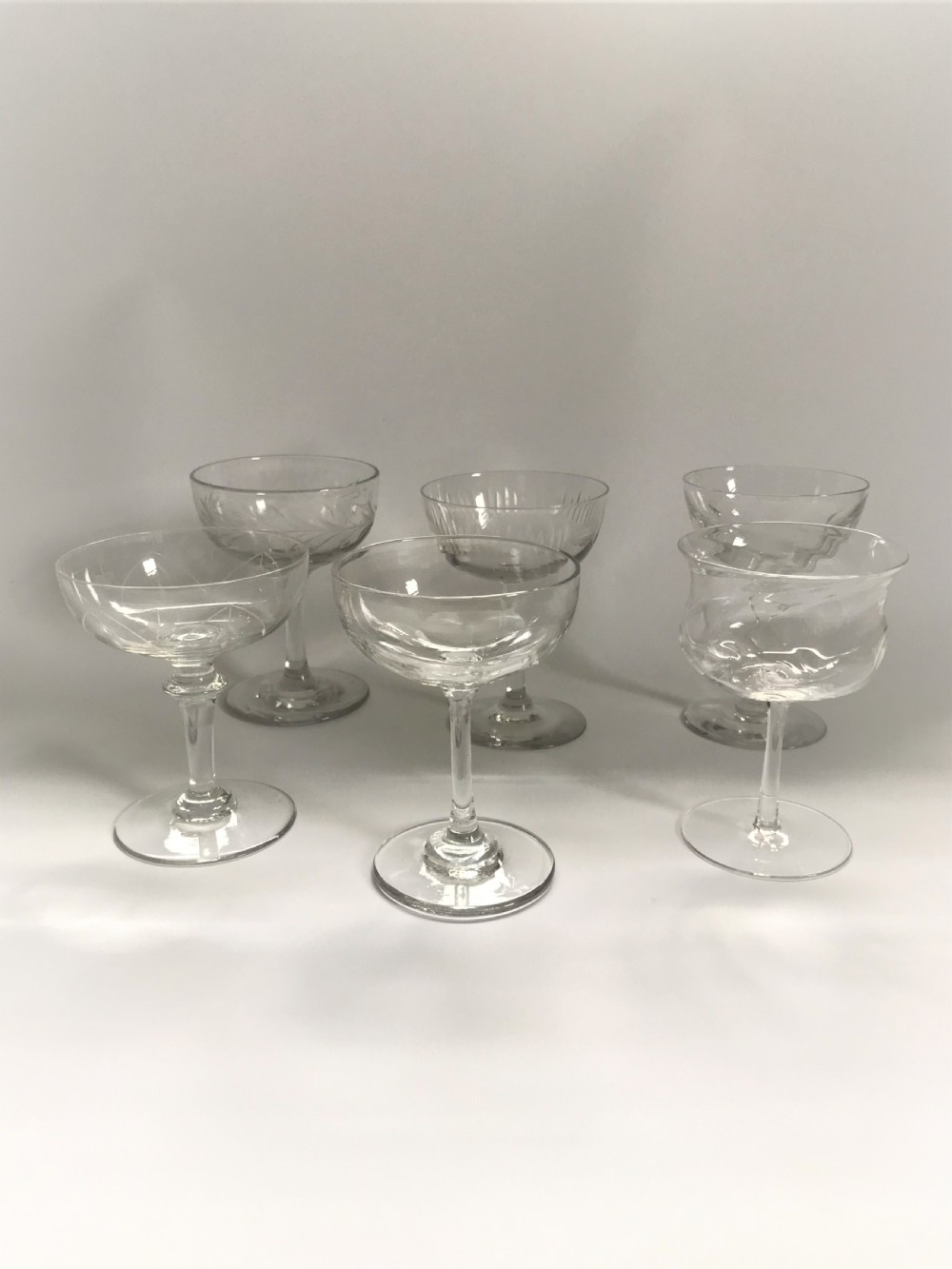 A lovely harlequin set of 6 champagne bowls View III