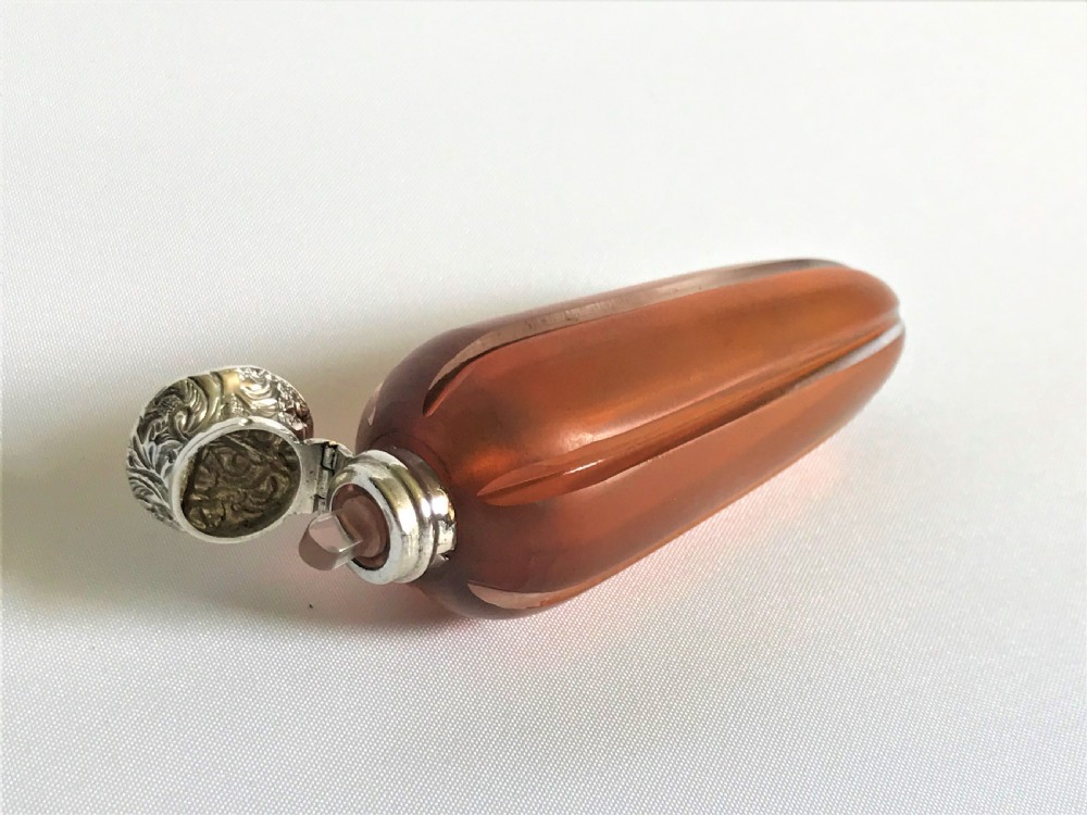A Victorian silver mounted satin glass amber scent flask View V