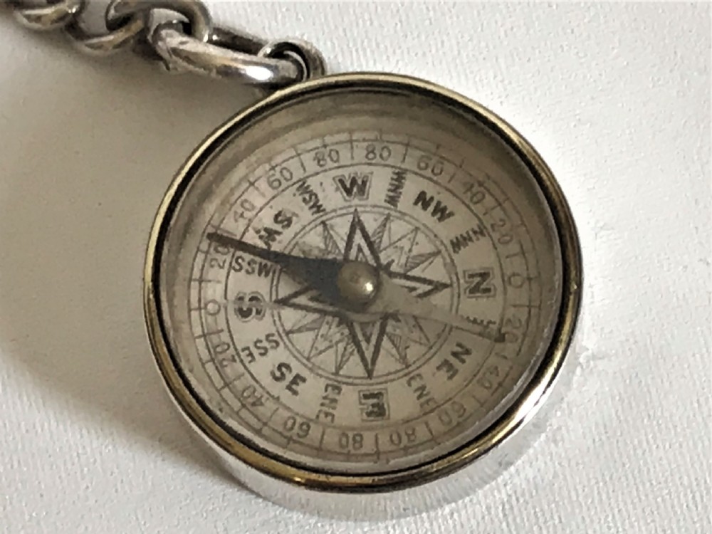 A rare silver fob chain and compass View II