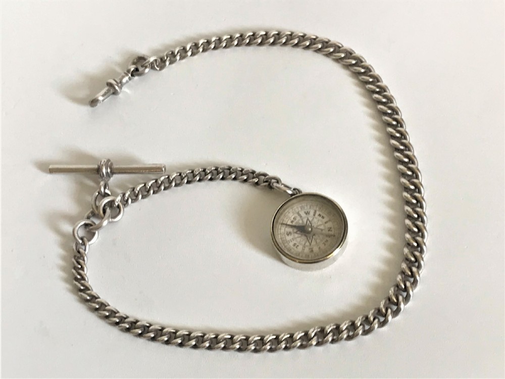 A rare silver fob chain and compass View III