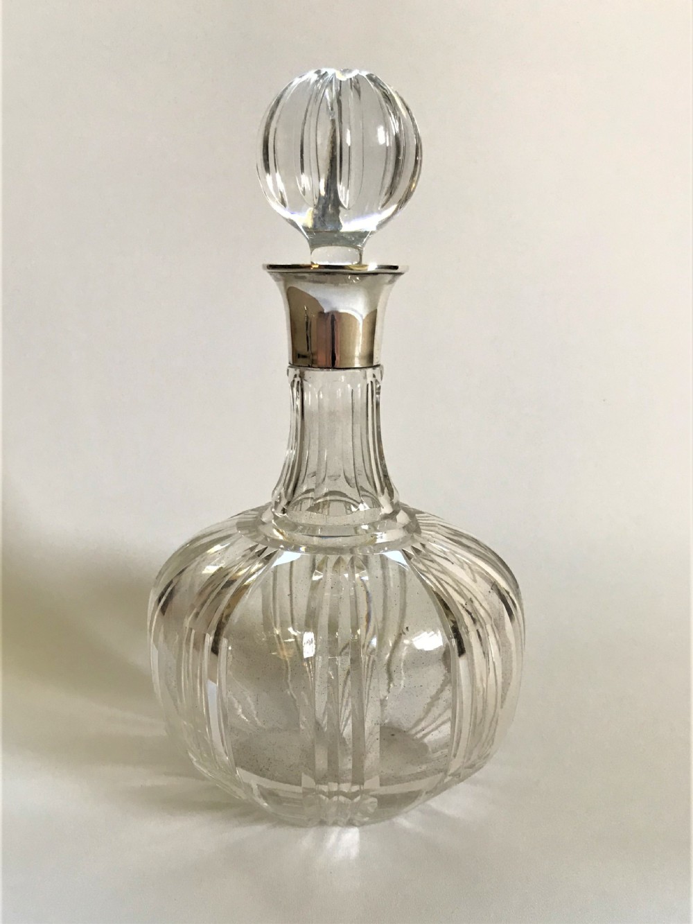 A handsome Art Deco silver mounted decanter