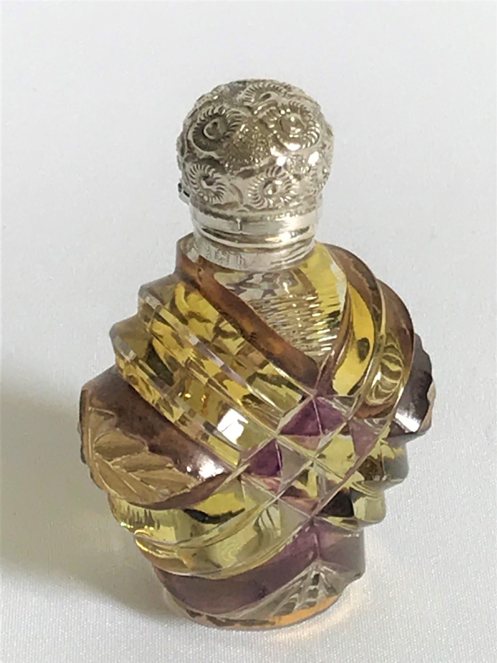 A superb Victorian silver mounted amber glass scent bottle