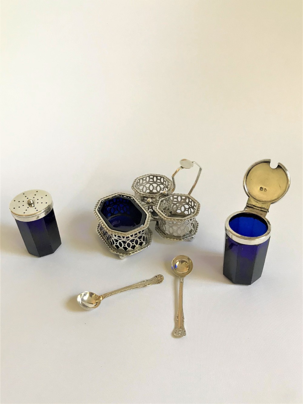 A superb Victorian silver & glass three piece cruet with spoons View V