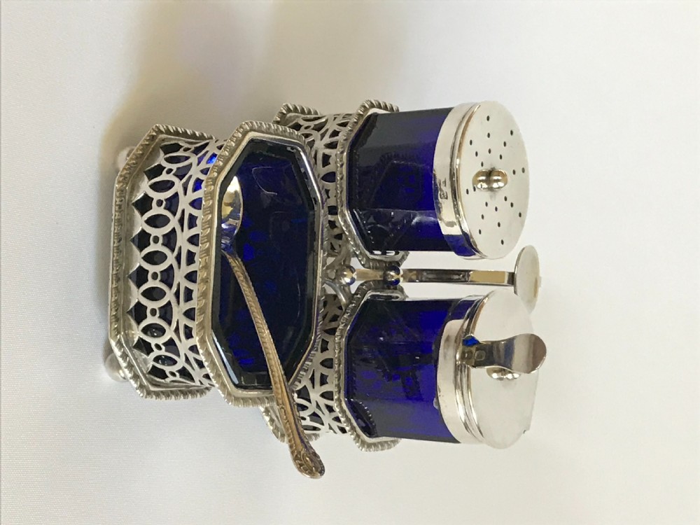A superb Victorian silver & glass three piece cruet with spoons View VI