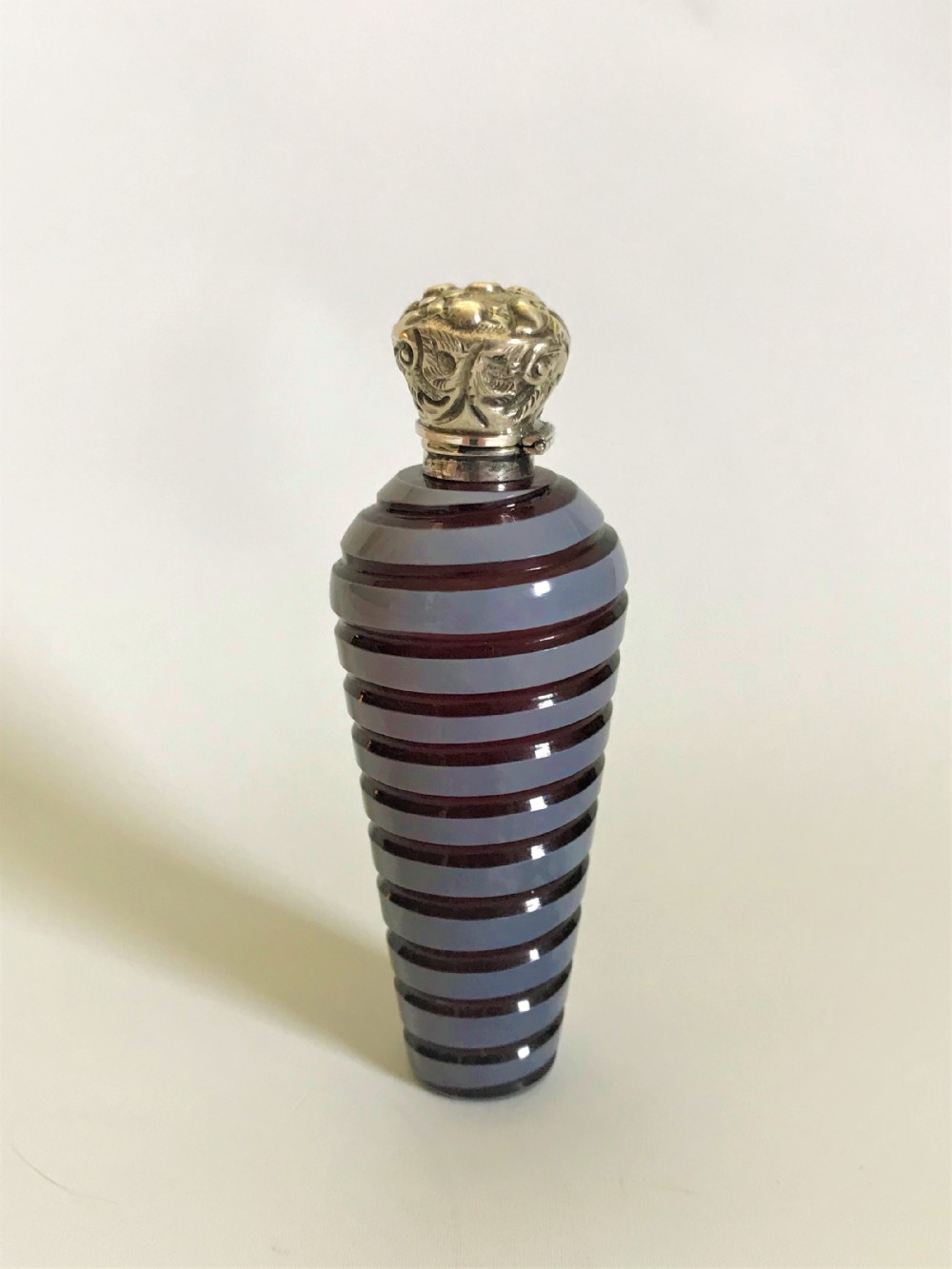 A superb and unusual Victorian silver mounted scent bottle