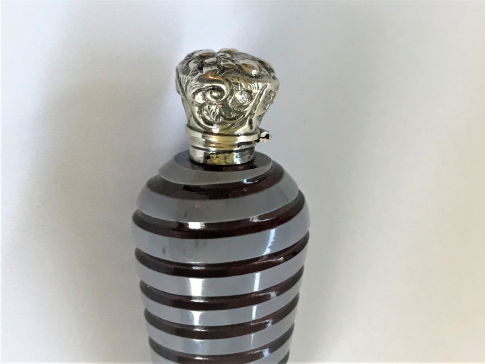 A superb and unusual Victorian silver mounted scent bottle View VII