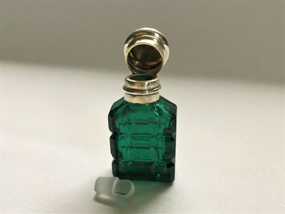 A diminutive Victorian silver mounted scent bottle View V