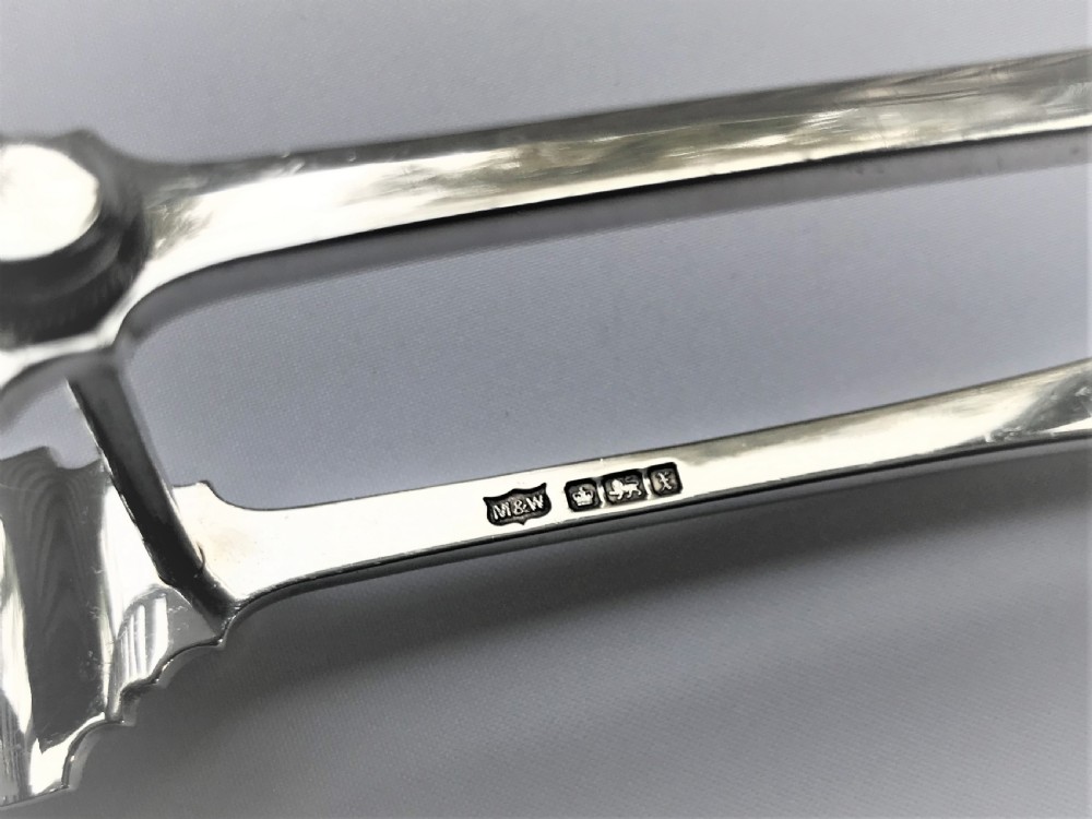 A superb quality pair of silver asparagus tongs View VI