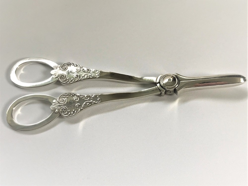 A boxed pair of Mappin & Webb silver grape shears View IV