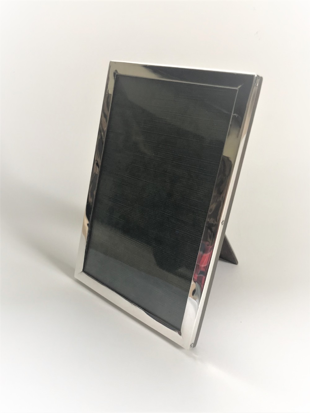 A handsome George V silver photo frame