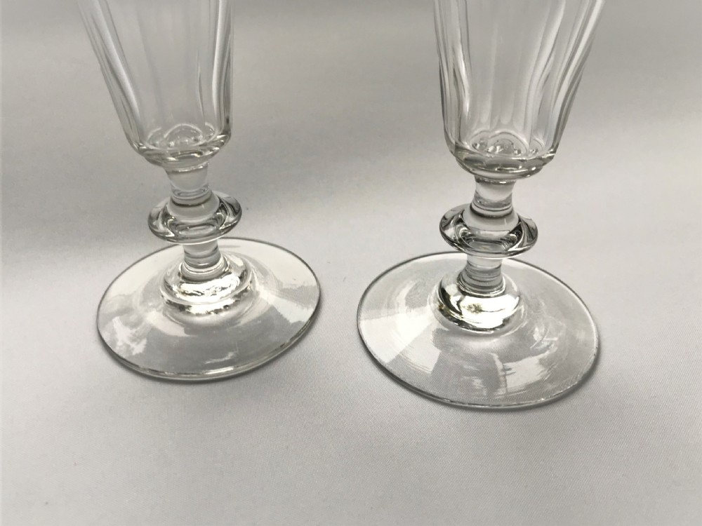 An elegant pair of cut glass champagne flutes View II