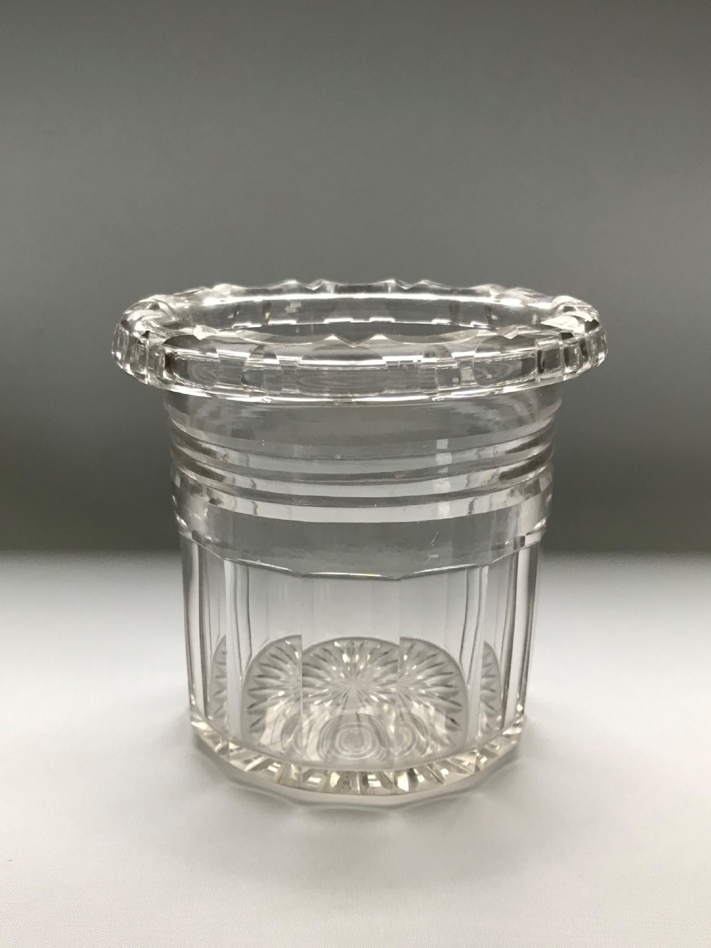 A rare Regency cut glass bottle/decanter coaster