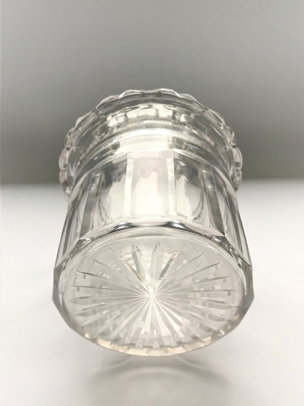 A rare Regency cut glass bottle/decanter coaster View VI