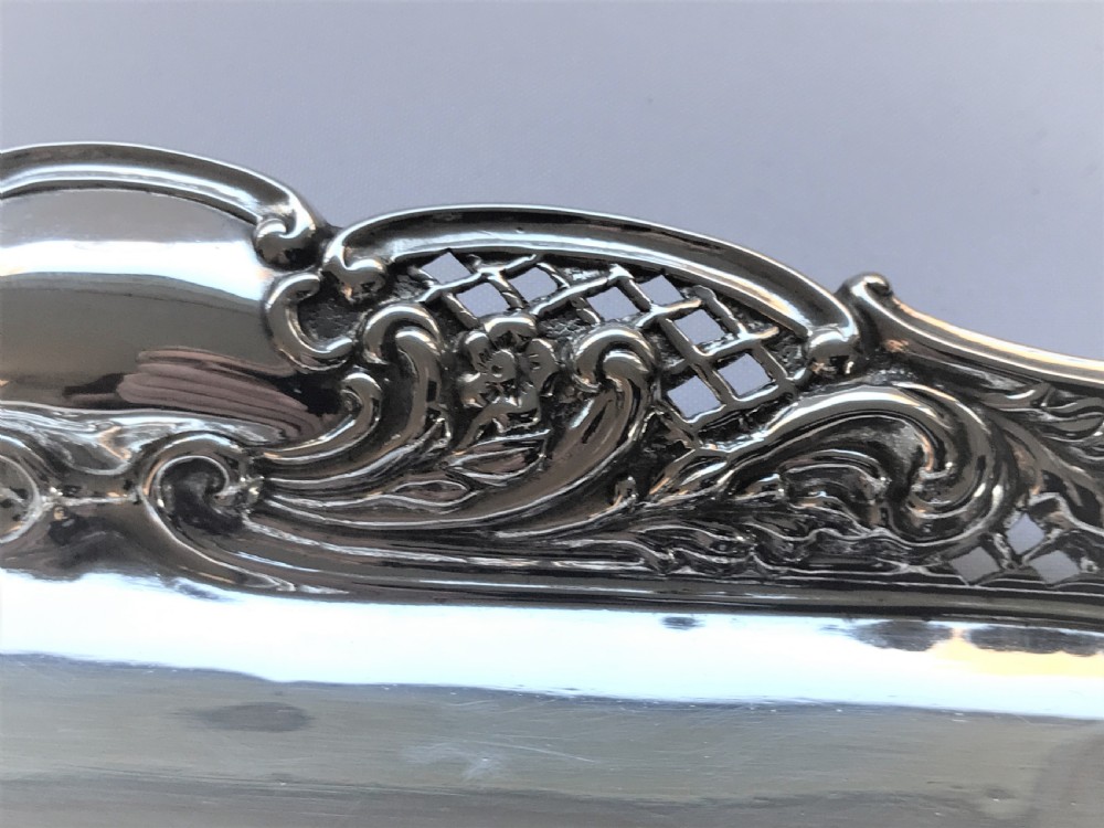 A pierced Edwardian silver pen tray View V