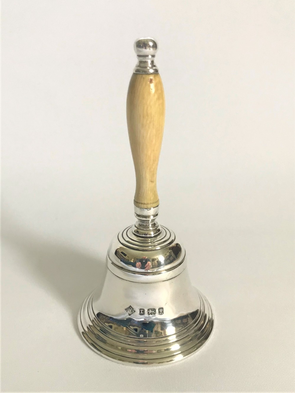 A magnificent quality silver table bell