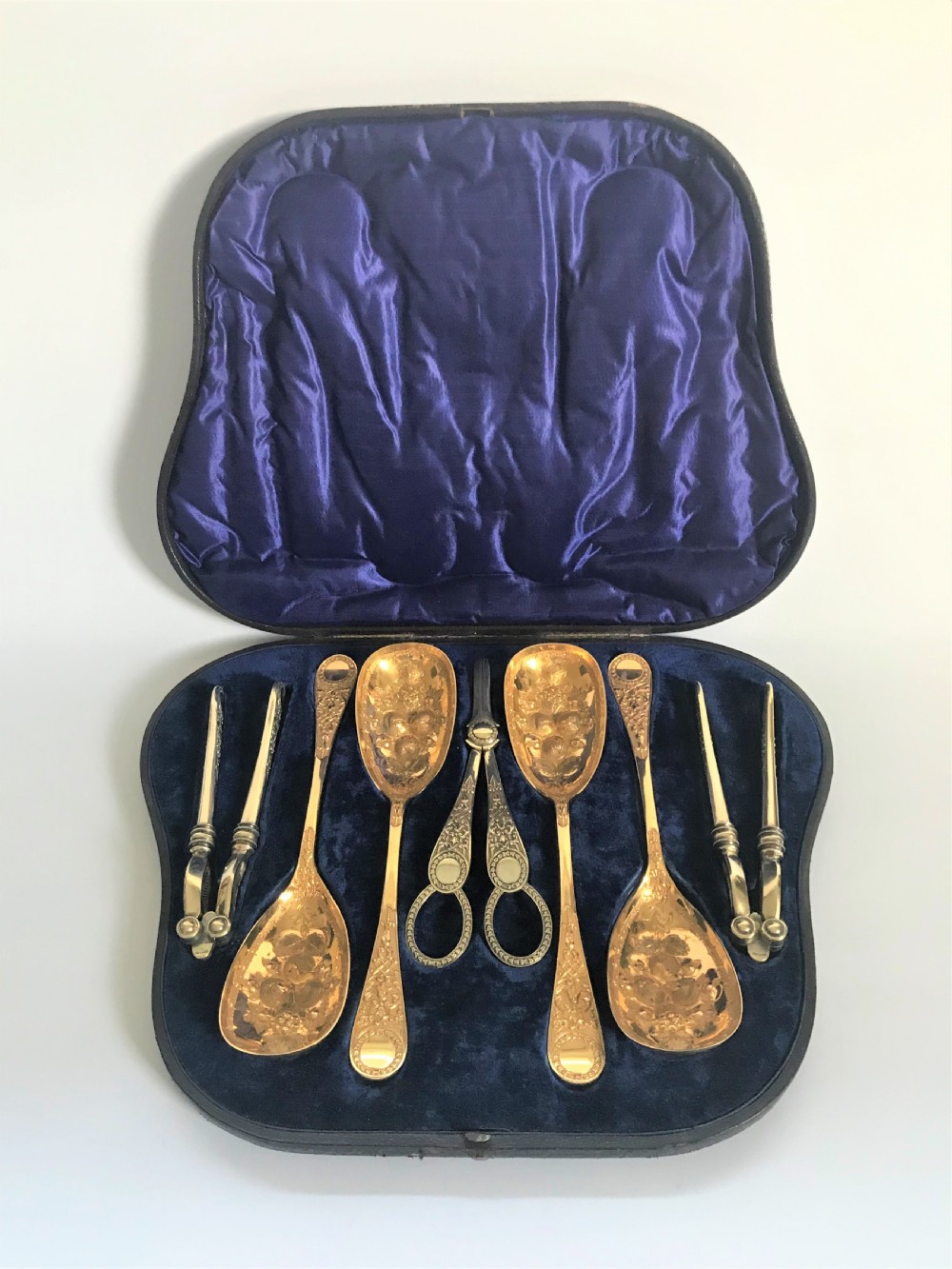 A fabulous boxed Victorian gilded silver plate dessert set