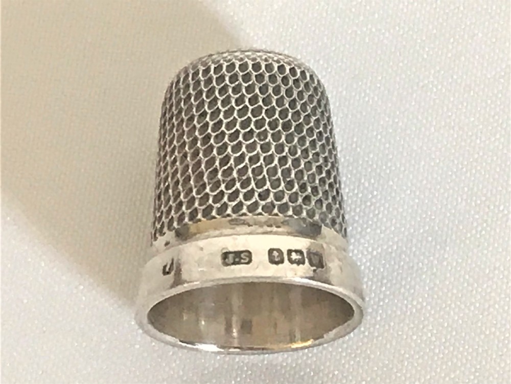 A 19th Century tortoiseshell cased silver thimble View VIII