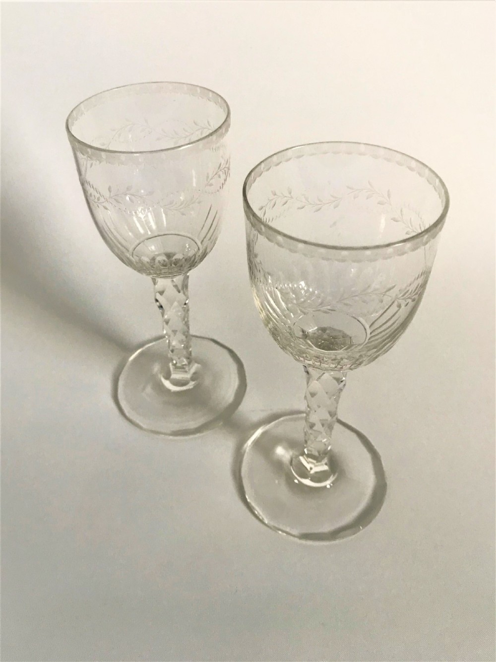 A superb pair of cut and etched cordial glasses View II