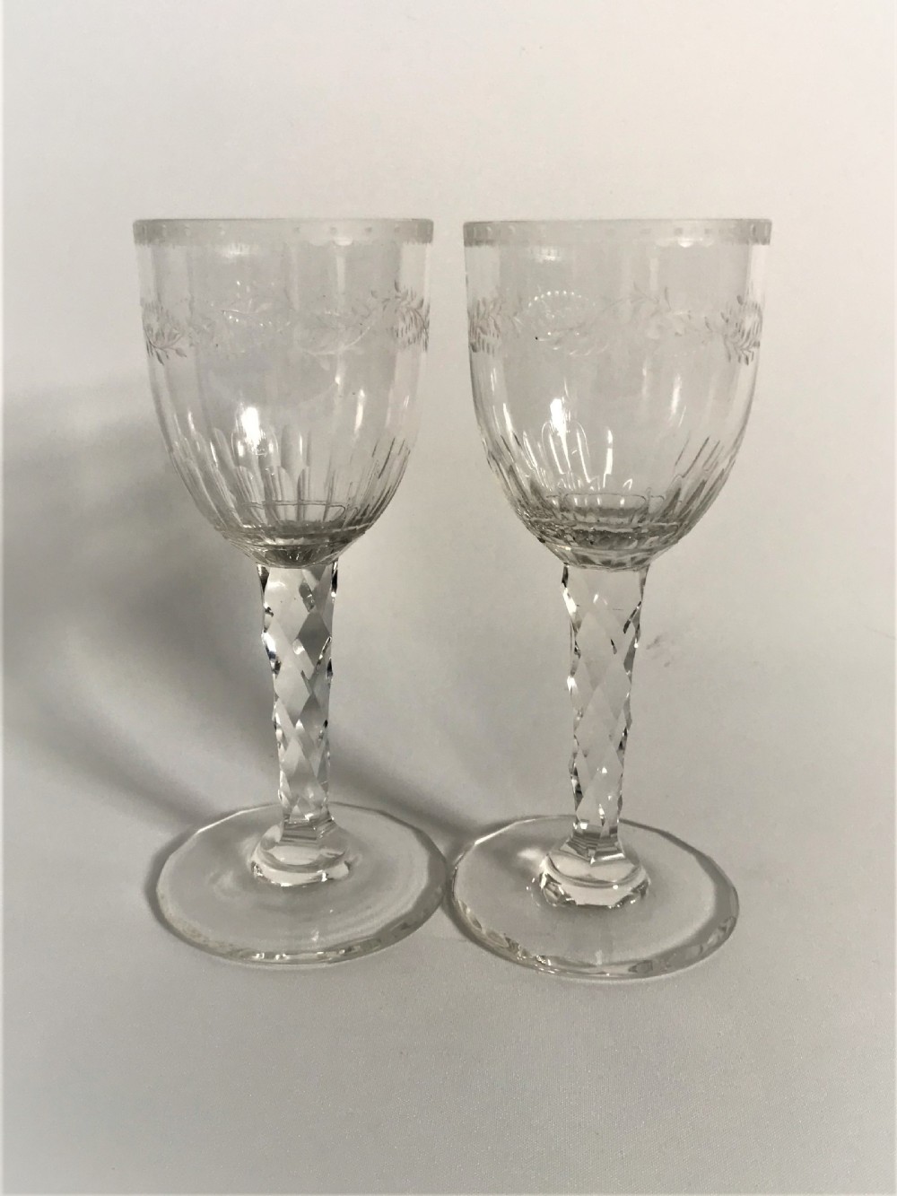 A superb pair of cut and etched cordial glasses View VI