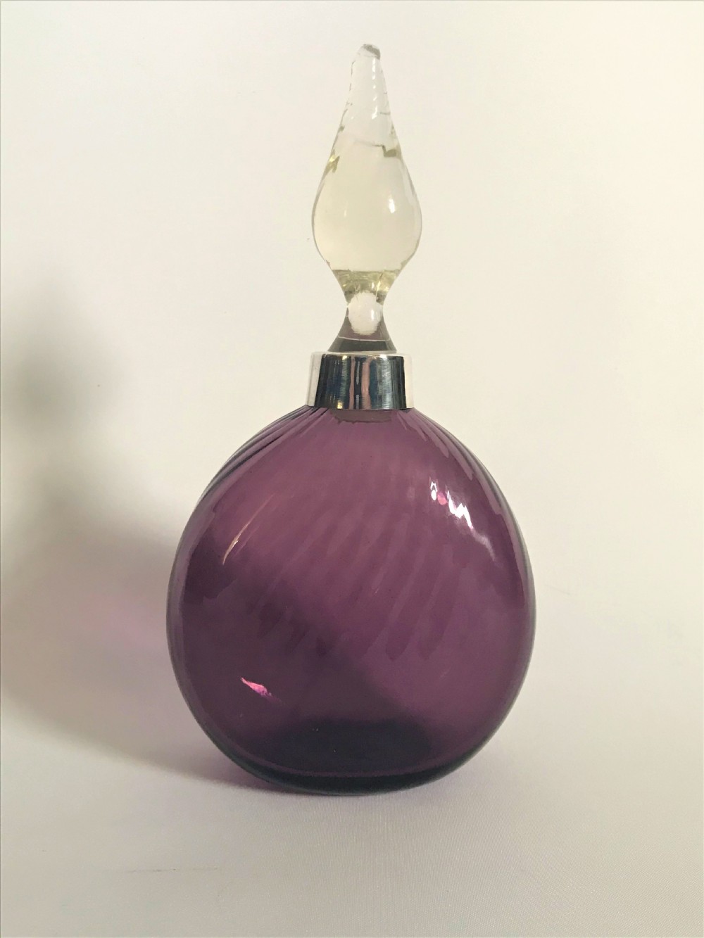 A silver mounted amethyst glass cologne bottle View II