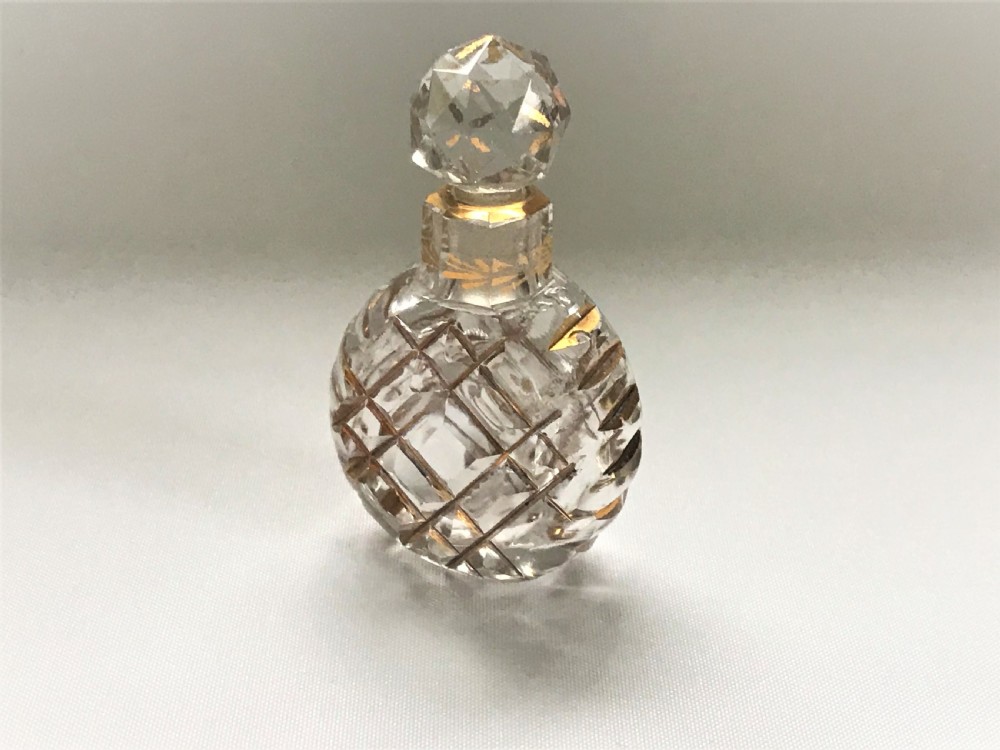 A charming French cut & gilded scent bottle