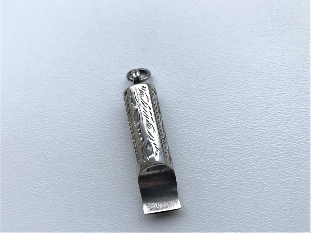 A delightful Edwardian silver dog whistle View II
