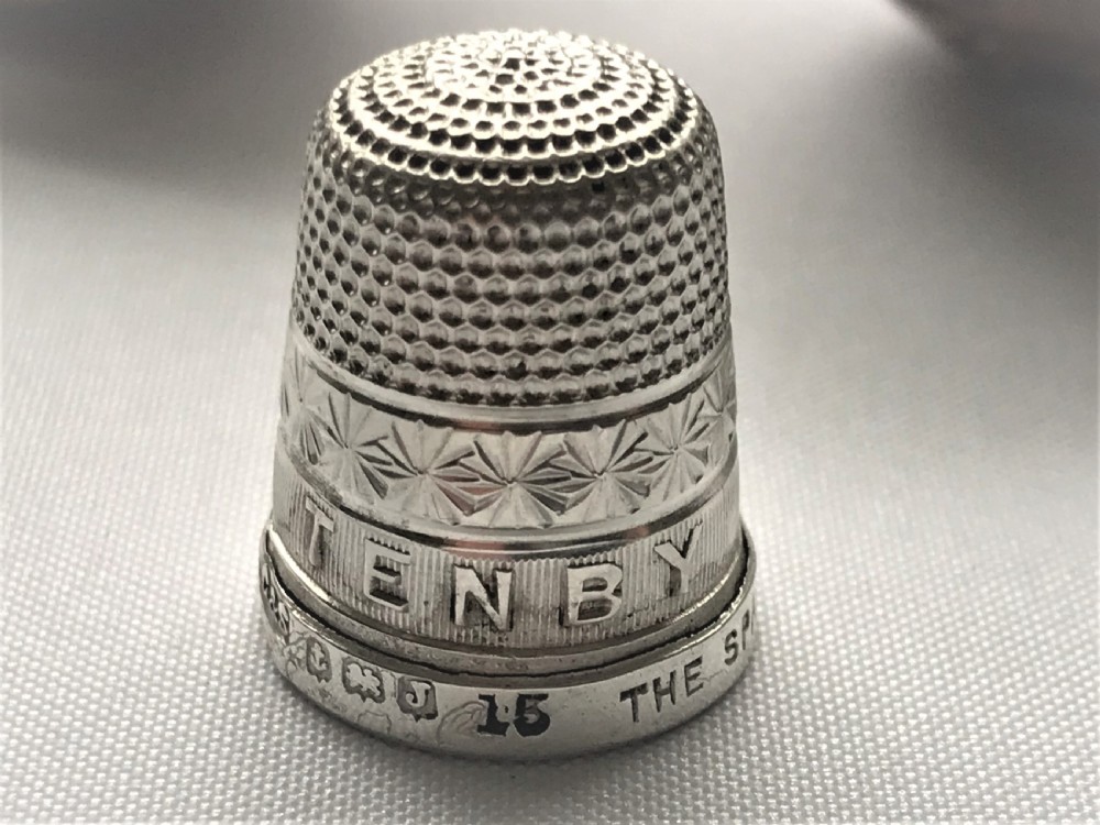 A gorgeous silver thimble & coquilla nut thimble case   View IV
