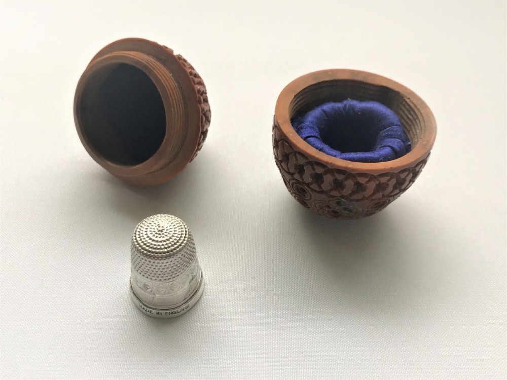 A gorgeous silver thimble & coquilla nut thimble case   View V