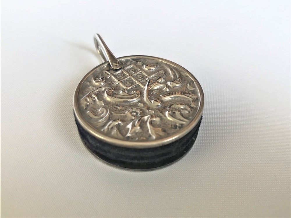 A charming Edwardian silver 'wheel' pin cushion  View III