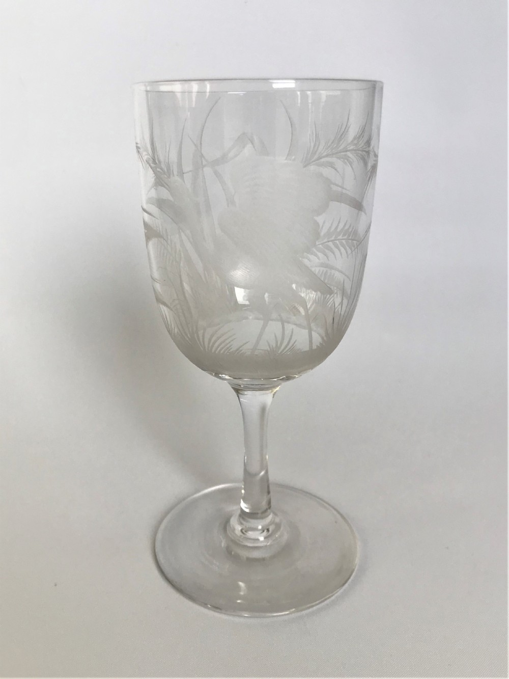 A superb Heron etched Victorian wine goblet