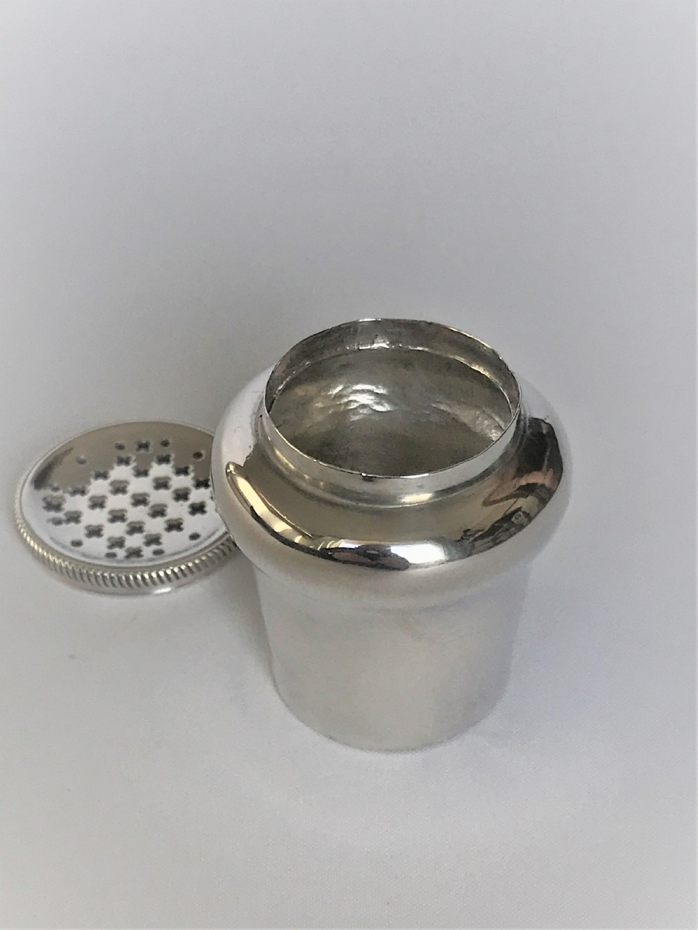 A Magdalen Feline hallmarked 18th Century silver pounce pot View IV