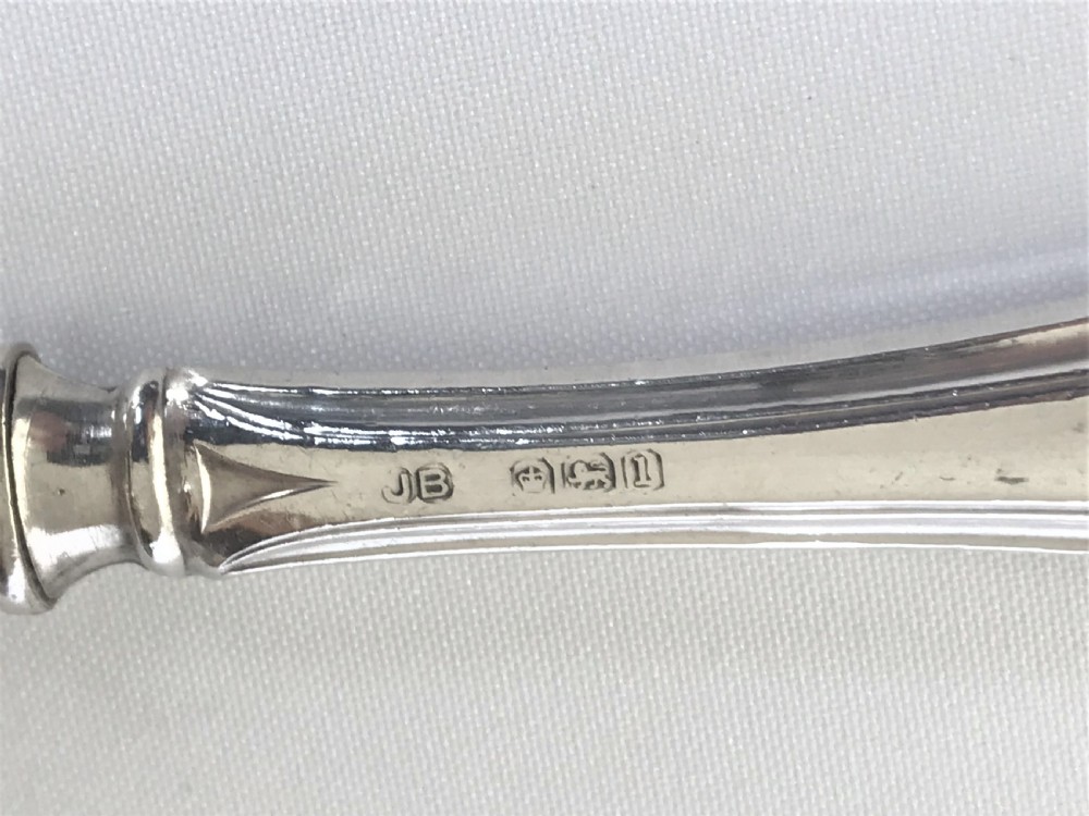 A rare silver handled orange peeler of patented design View II