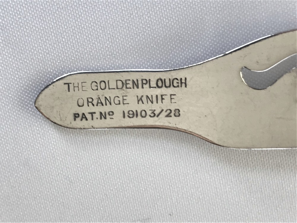 A rare silver handled orange peeler of patented design View III