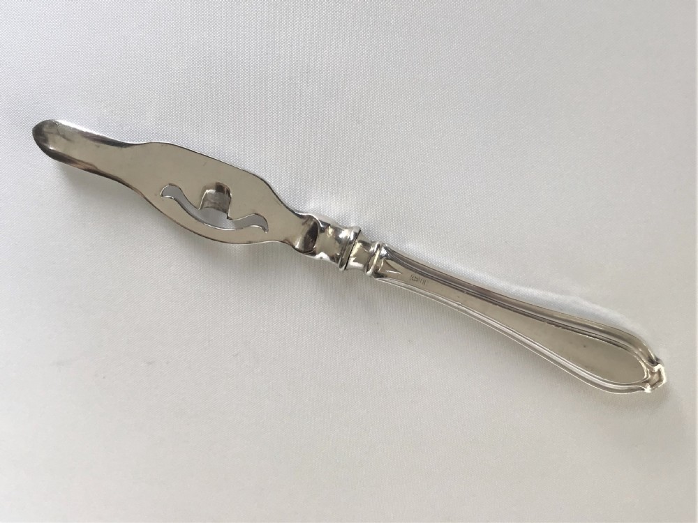 A rare silver handled orange peeler of patented design View IV