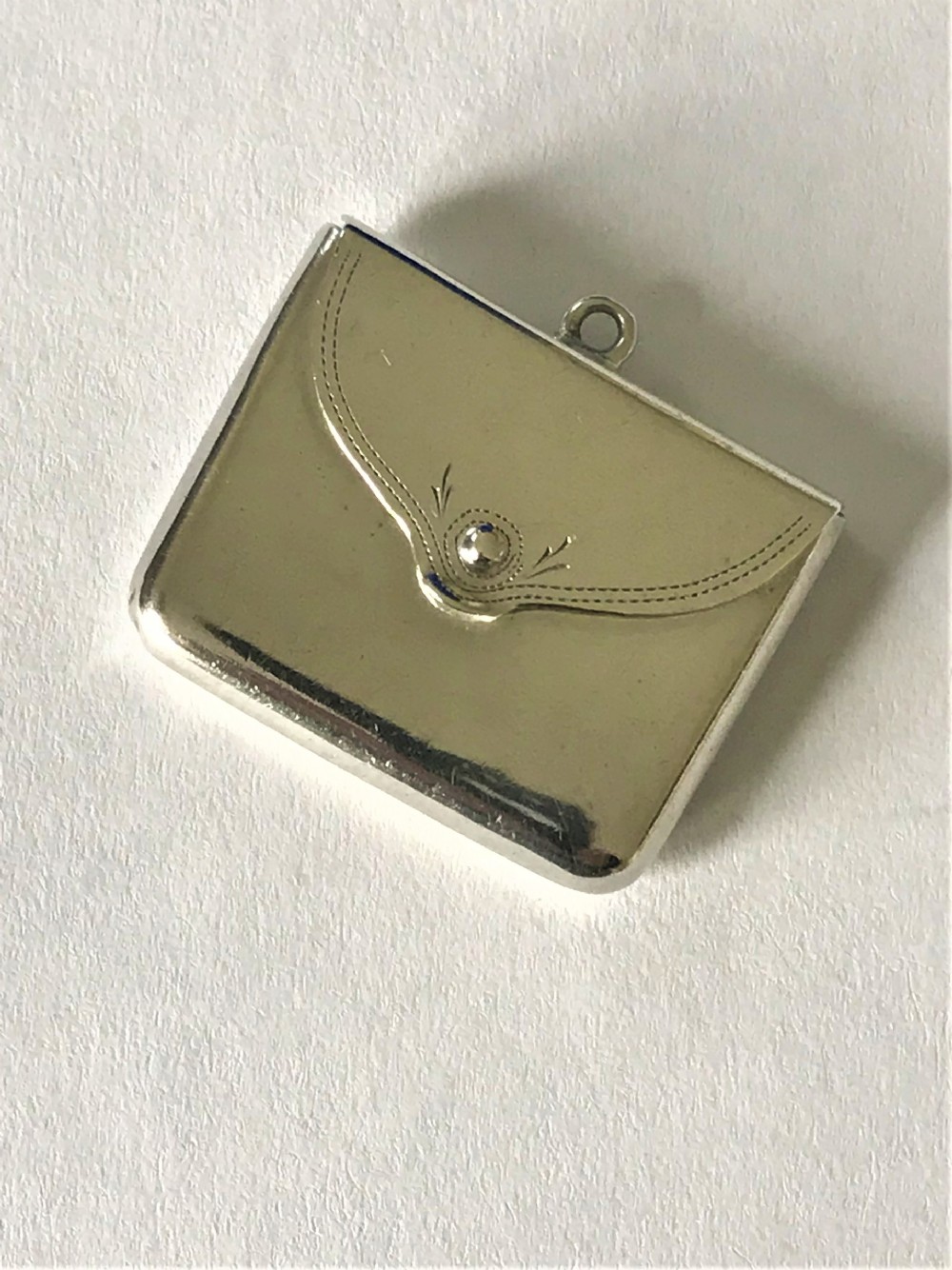 An early George V novelty silver stamp envelope