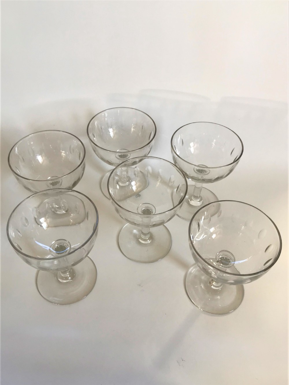 A charming set of 6 small cut champagne glasses View II
