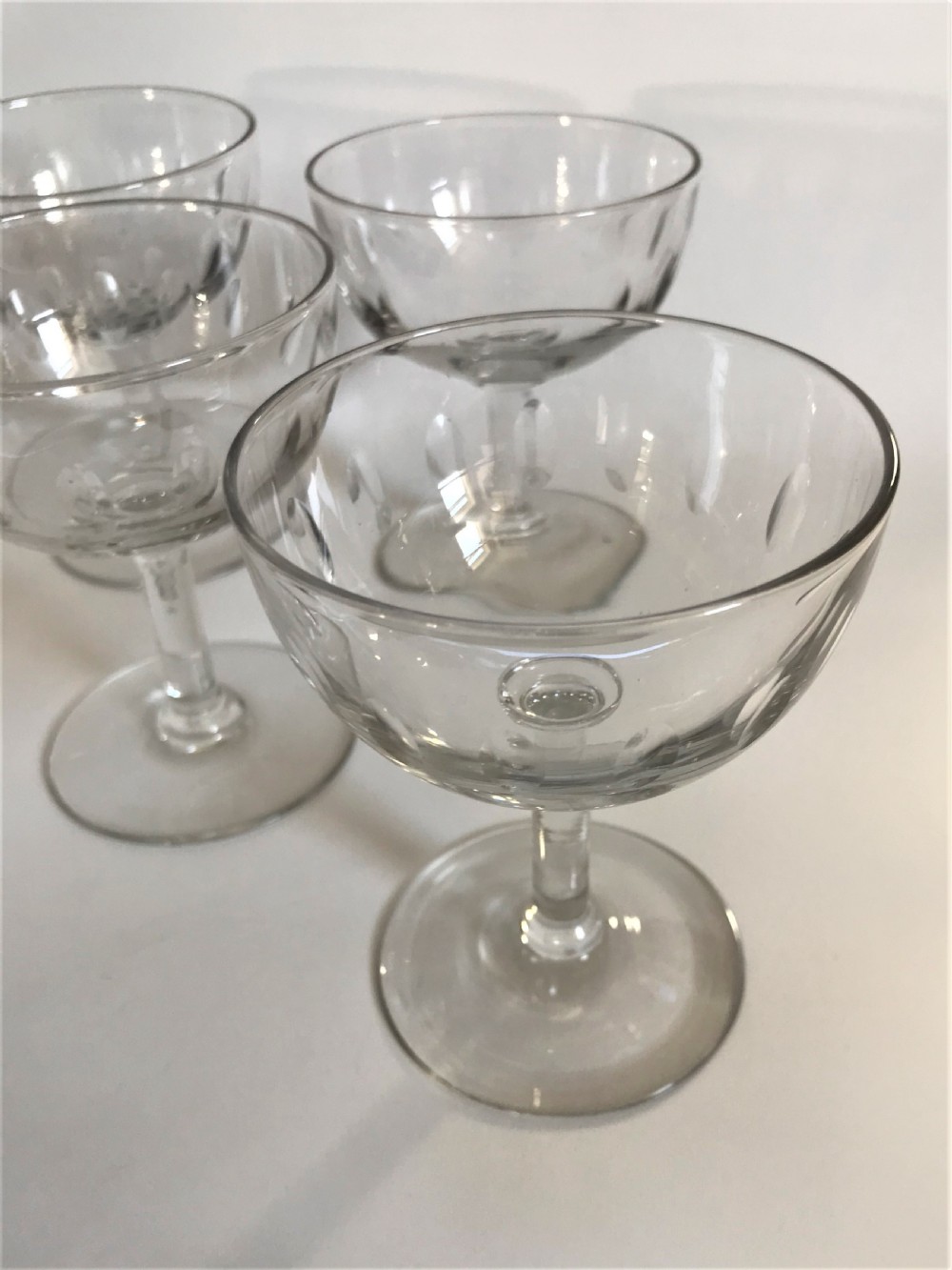 A charming set of 6 small cut champagne glasses View IV