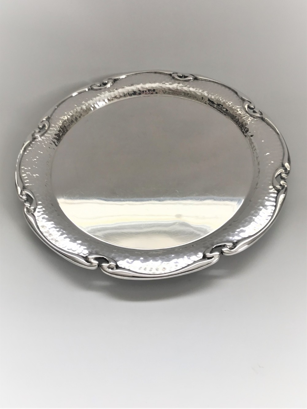 A stylish Arts & Crafts silver plated salver