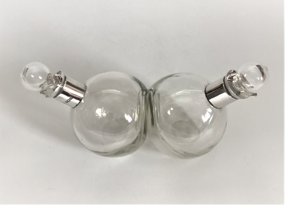 A charming silver mounted oil & vinegar set View II