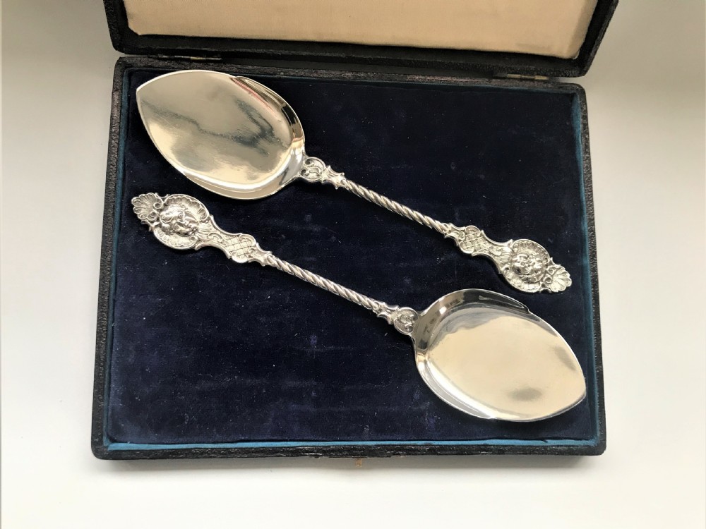 A superb pair of boxed cast silver preserve spoons View II