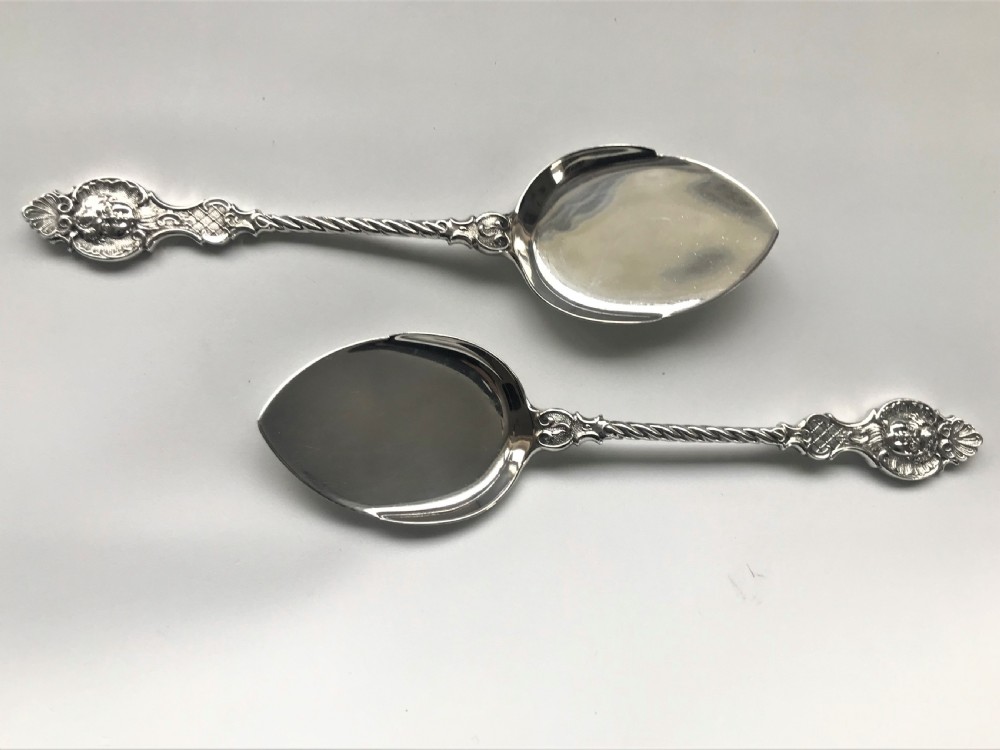 A superb pair of boxed cast silver preserve spoons View IV