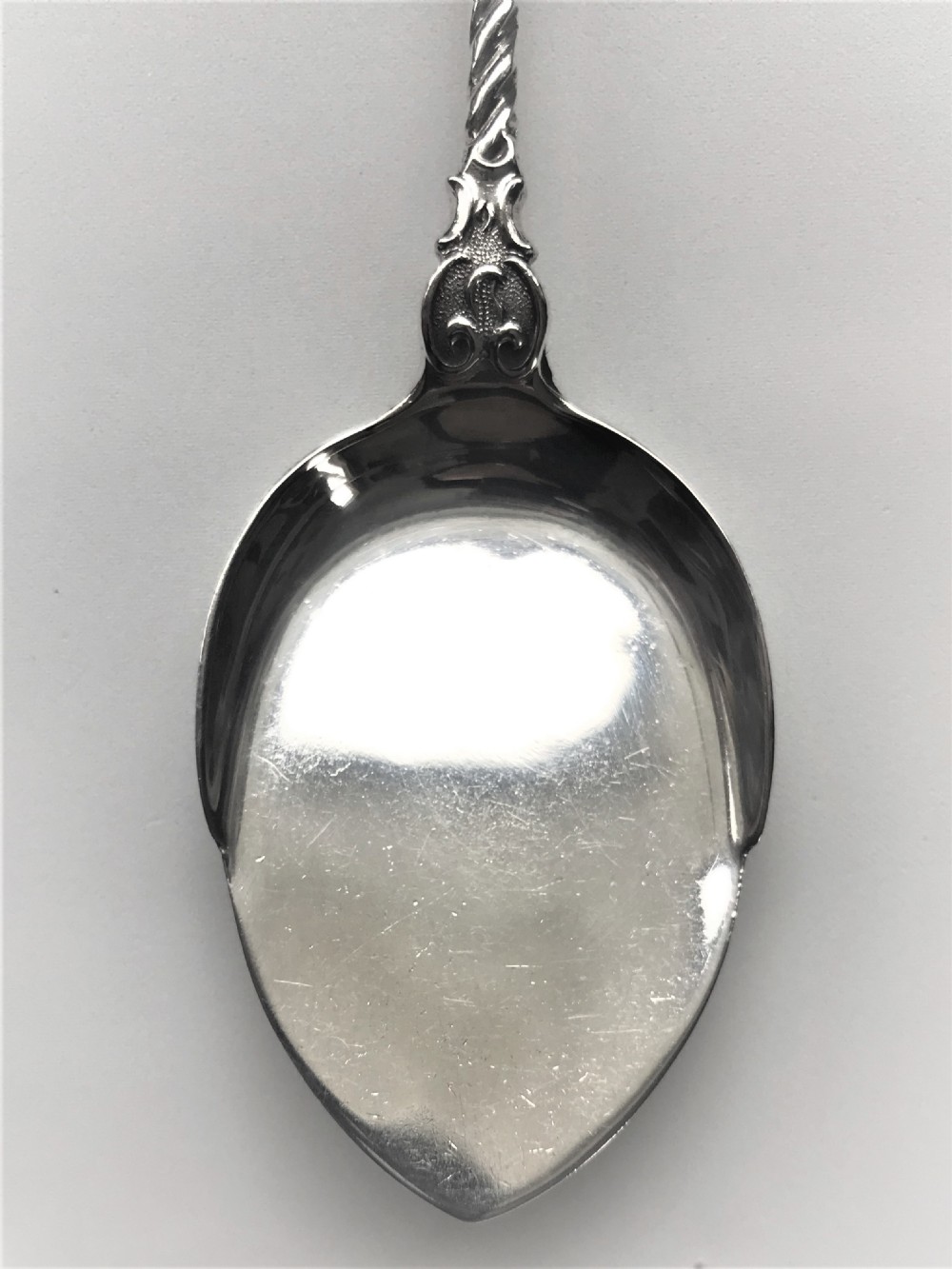 A superb pair of boxed cast silver preserve spoons View VI