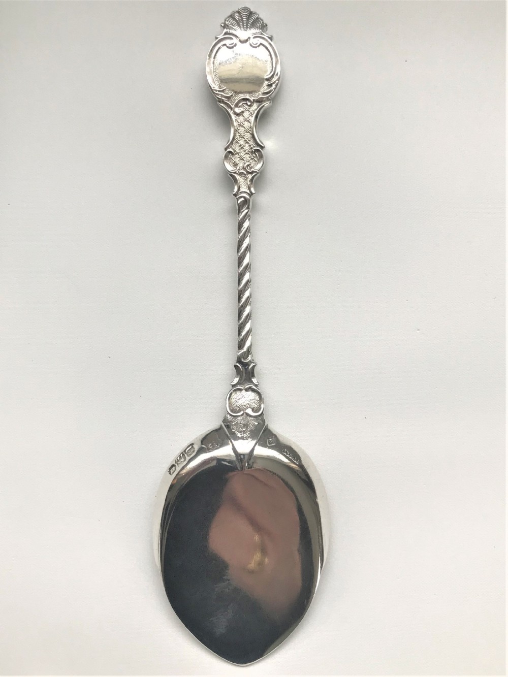 A superb pair of boxed cast silver preserve spoons View VII